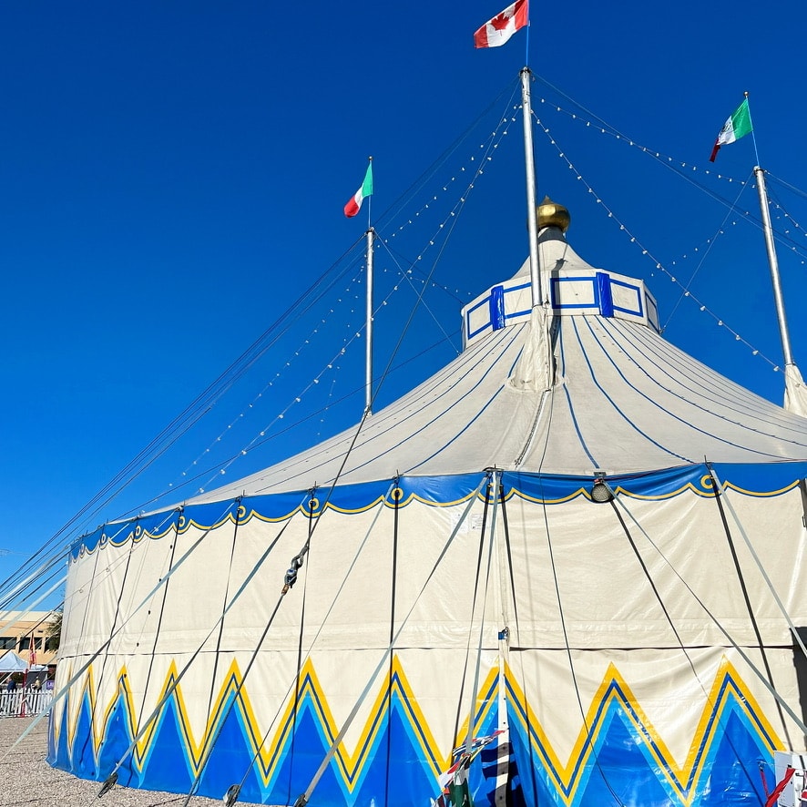 the exterior of a circular circus tent